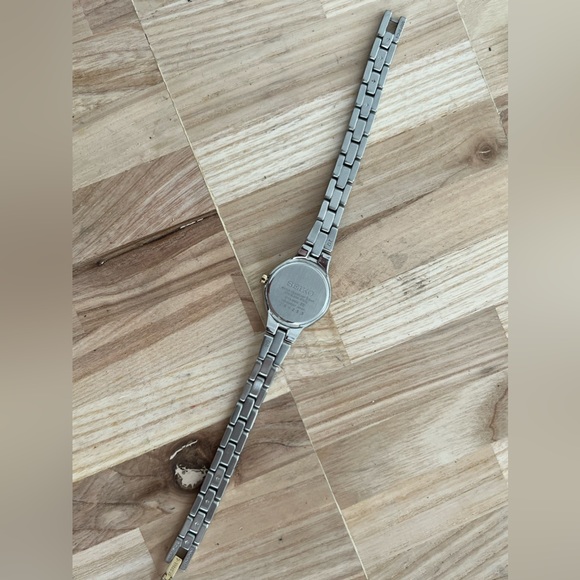 Seiko Solar Ladies Watch Two Tone Bracelet Round White Dial - Picture 12 of 15